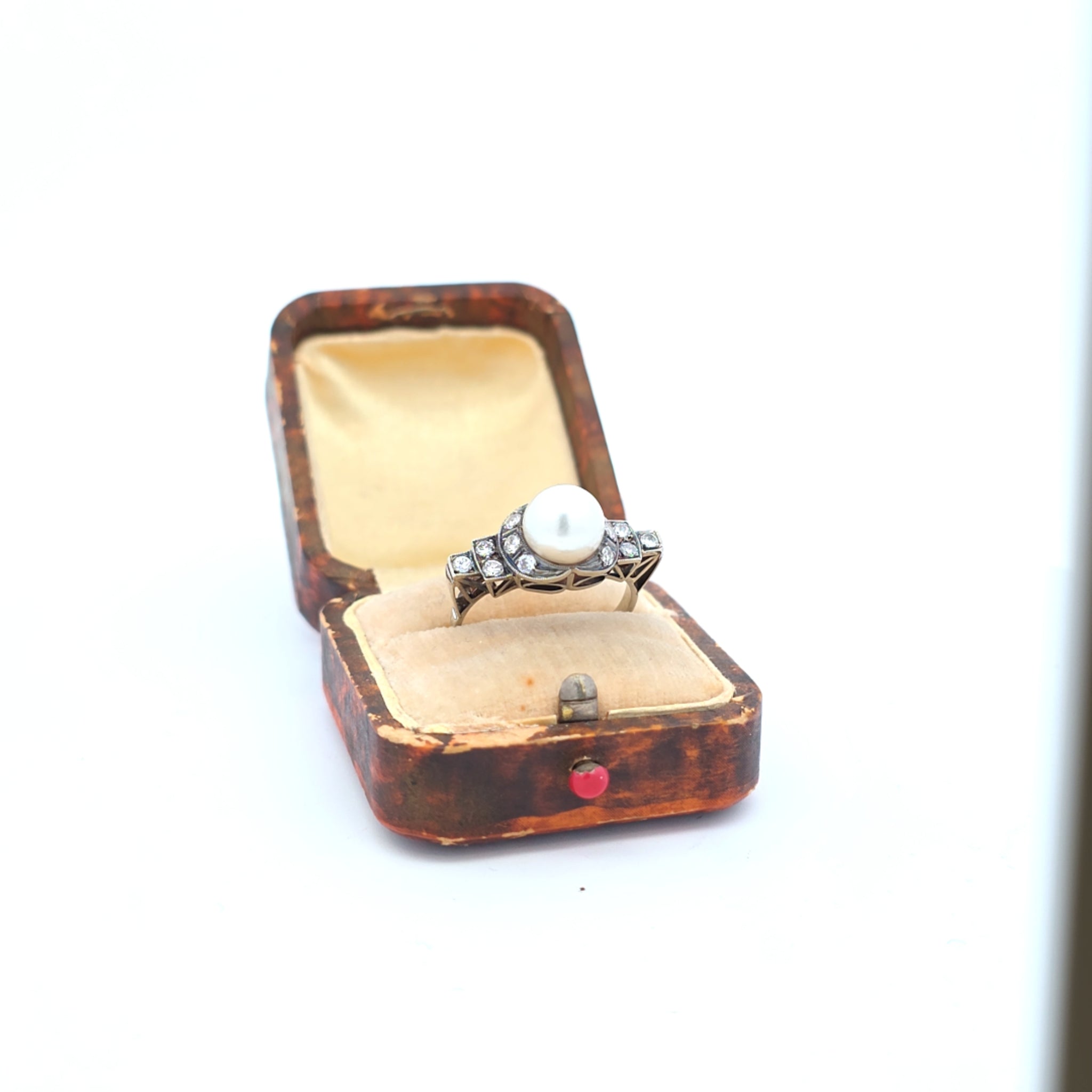 Antieke 14k witgouden ring met een parel en diamanten