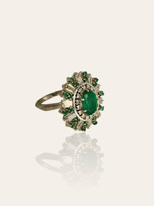 1960s/1970s white gold cocktail ring set with emerald, baguette and brilliant cut diamonds